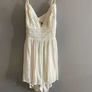 White romper with open back